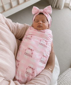 Girl swaddle with bow band